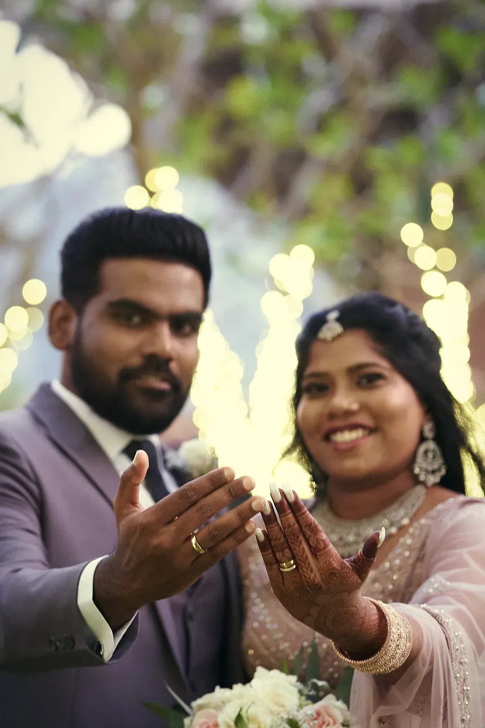 Dishon and Suweda showing their rings